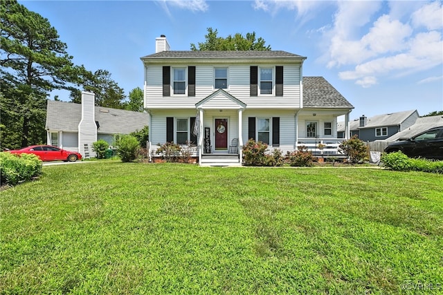 4901 Green Run Dr, Henrico, VA 23228 - colonial house featuring a front lawn, covered porch, and a chimney