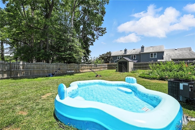 4901 Green Run Dr, Henrico, VA 23228 - view of swimming pool with a shed and a fenced backyard