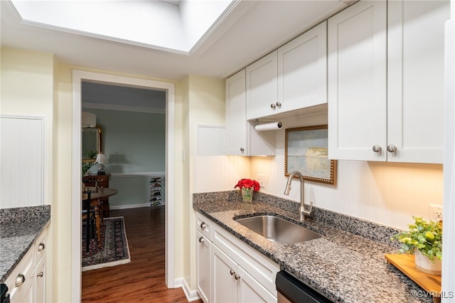 2956 Hathaway Rd Unit 807, Richmond, VA 23225 - kitchen with wood finished floors, white cabinets, and dark stone counters