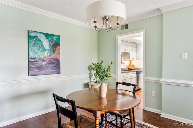 2956 Hathaway Rd Unit 807, Richmond, VA 23225 - dining area with a chandelier, dark wood-type flooring, and ornamental molding