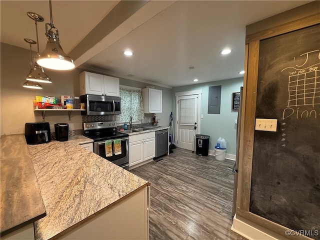 411 Sherman Ave, Hopewell, VA 23860 - kitchen featuring appliances with stainless steel finishes, electric panel, light countertops, white cabinetry, and recessed lighting