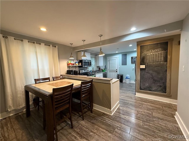 411 Sherman Ave, Hopewell, VA 23860 - dining area featuring dark wood finished floors and recessed lighting