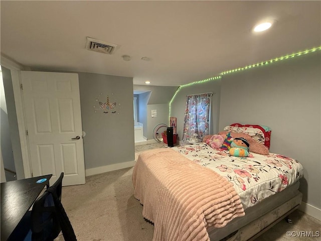 411 Sherman Ave, Hopewell, VA 23860 - bedroom with light colored carpet, ensuite bathroom, and recessed lighting