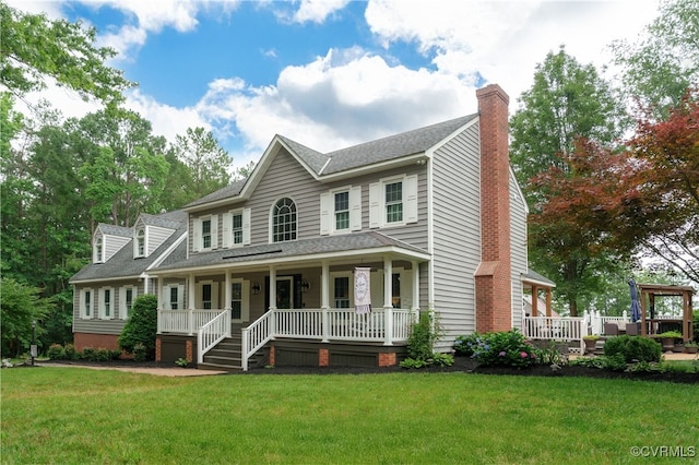 1442 Dorset Rd, Powhatan, VA 23139 - view of front of house featuring a porch, roof with shingles, a front lawn, and a chimney
