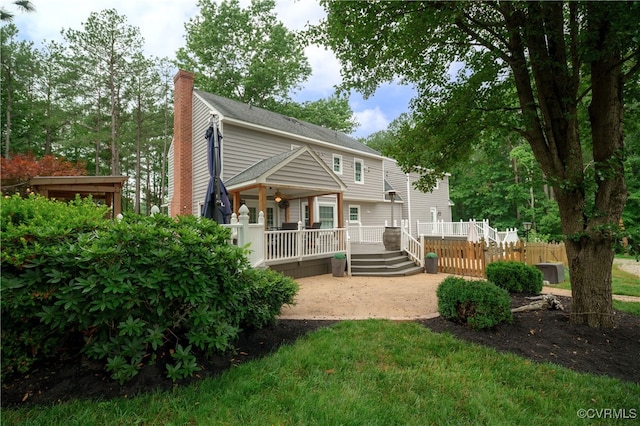 1442 Dorset Rd, Powhatan, VA 23139 - rear view of property with a chimney, a wooden deck, and ceiling fan