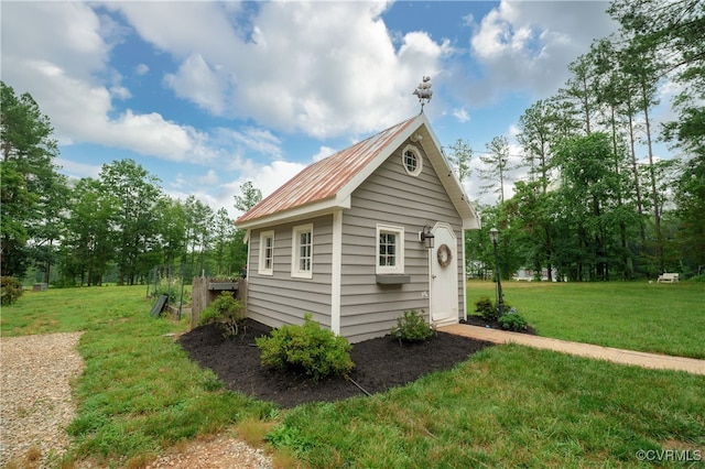 1442 Dorset Rd, Powhatan, VA 23139 - view of home's exterior with an outdoor structure and a lawn
