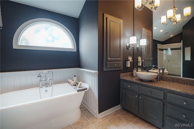 1442 Dorset Rd, Powhatan, VA 23139 - bathroom with a chandelier, a shower stall, vanity, lofted ceiling, and a freestanding bath