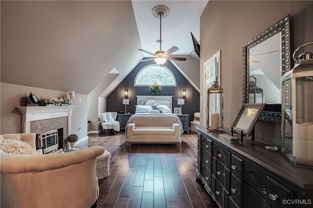 1442 Dorset Rd, Powhatan, VA 23139 - bedroom with dark wood finished floors, lofted ceiling, and a glass covered fireplace