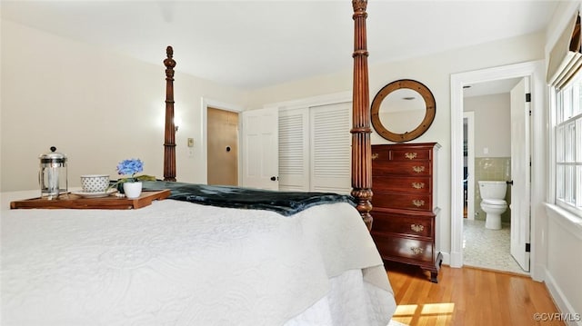 2711 Salisbury Rd, Midlothian, VA 23113 - bedroom with a closet, light wood-style flooring, and connected bathroom