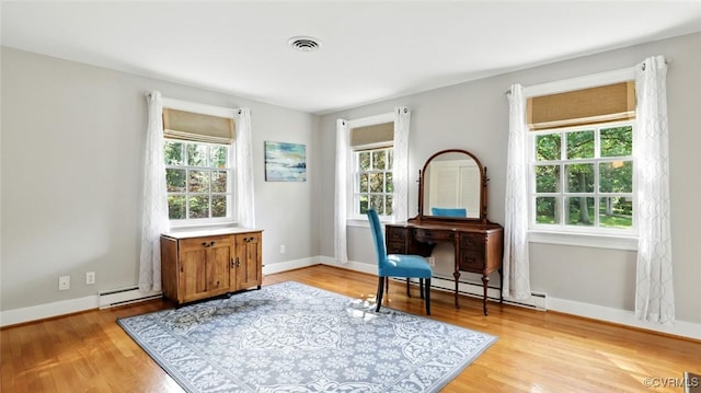 2711 Salisbury Rd, Midlothian, VA 23113 - office with healthy amount of natural light, light wood-style flooring, and a baseboard radiator