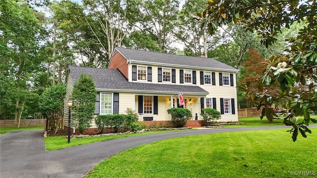 2711 Salisbury Rd, Midlothian, VA 23113 - colonial-style house featuring asphalt driveway and a porch