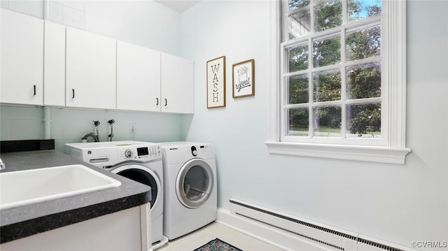 2711 Salisbury Rd, Midlothian, VA 23113 - laundry room with a baseboard radiator, cabinet space, and washing machine and clothes dryer