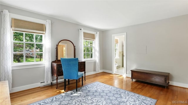 2711 Salisbury Rd, Midlothian, VA 23113 - office area with a baseboard radiator and wood finished floors