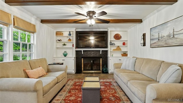 2711 Salisbury Rd, Midlothian, VA 23113 - living area featuring beam ceiling, a ceiling fan, crown molding, and a brick fireplace