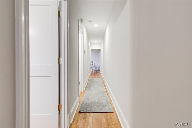 619 Roseneath Rd Unit U21, Richmond, VA 23221 - corridor with light wood-type flooring, arched walkways, and recessed lighting
