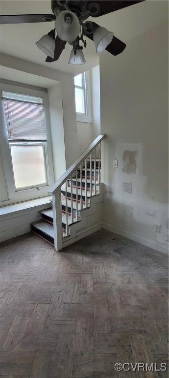 22 Corling St, Petersburg, VA 23803 - staircase with a ceiling fan and baseboards