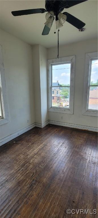 22 Corling St, Petersburg, VA 23803 - unfurnished room featuring dark wood finished floors and a ceiling fan