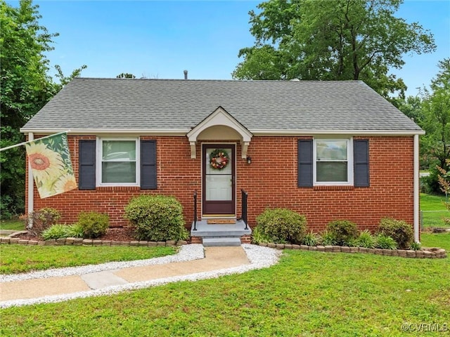 1627 Skipwith Rd, Henrico, VA 23229 - bungalow-style house with brick siding, a front lawn, and roof with shingles