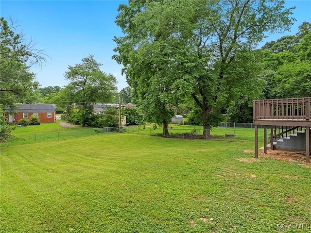 1627 Skipwith Rd, Henrico, VA 23229 - view of yard featuring a wooden deck, stairway, and view of scattered trees