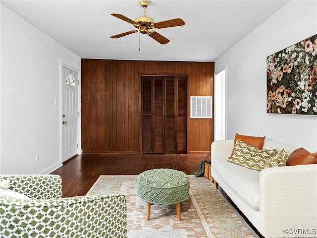 1627 Skipwith Rd, Henrico, VA 23229 - living room featuring wood finished floors, a ceiling fan, and wooden walls