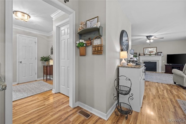 11830 Explorer Ct, Midlothian, VA 23114 - corridor featuring light wood-type flooring and ornamental molding