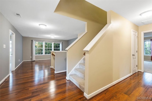 8738 New Holland Ln, Mechanicsville, VA 23116 - entryway with wood finished floors, plenty of natural light, and stairs