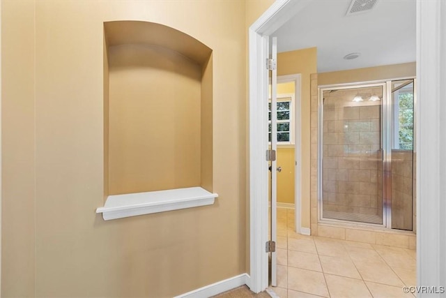 8738 New Holland Ln, Mechanicsville, VA 23116 - bathroom featuring a stall shower and tile patterned flooring