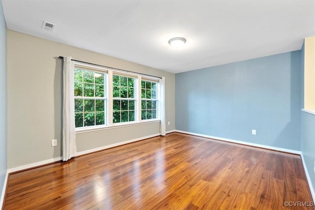 8738 New Holland Ln, Mechanicsville, VA 23116 - unfurnished room with wood finished floors