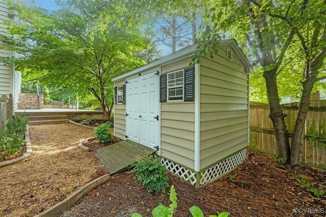 8738 New Holland Ln, Mechanicsville, VA 23116 - view of shed featuring a fenced backyard
