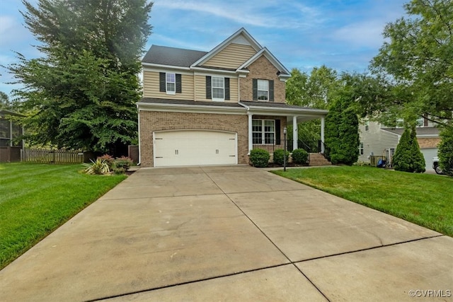 8738 New Holland Ln, Mechanicsville, VA 23116 - traditional home featuring brick siding, a porch, an attached garage, and concrete driveway