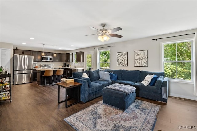 7318 Lancewood Ct, Chesterfield, VA 23832 - living area featuring healthy amount of natural light, a ceiling fan, dark wood finished floors, and recessed lighting