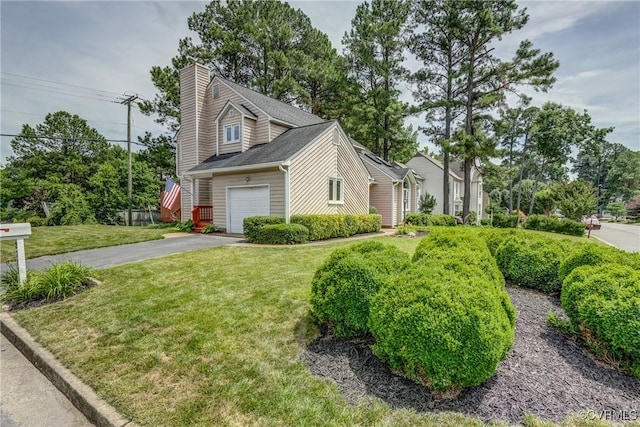 2711 Robson Ct, Henrico, VA 23233 - view of front of home featuring asphalt driveway, a garage, a front lawn, and a chimney