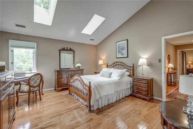 2711 Robson Ct, Henrico, VA 23233 - bedroom with a skylight, light wood-type flooring, and high vaulted ceiling