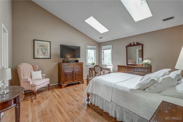 2711 Robson Ct, Henrico, VA 23233 - bedroom featuring a skylight, light wood-style flooring, and high vaulted ceiling