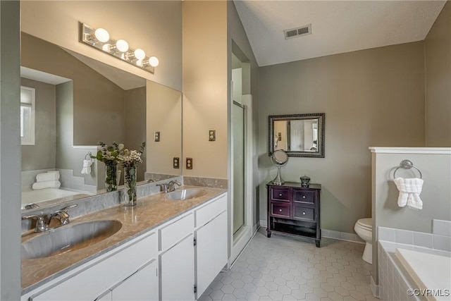 2711 Robson Ct, Henrico, VA 23233 - full bath featuring double vanity, a stall shower, a bath, tile patterned flooring, and vaulted ceiling