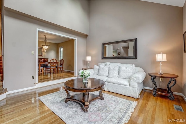 2711 Robson Ct, Henrico, VA 23233 - living room with wood finished floors and a high ceiling