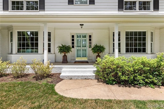 8950 Bellefonte Rd, Henrico, VA 23229 - doorway to property featuring a porch and brick siding