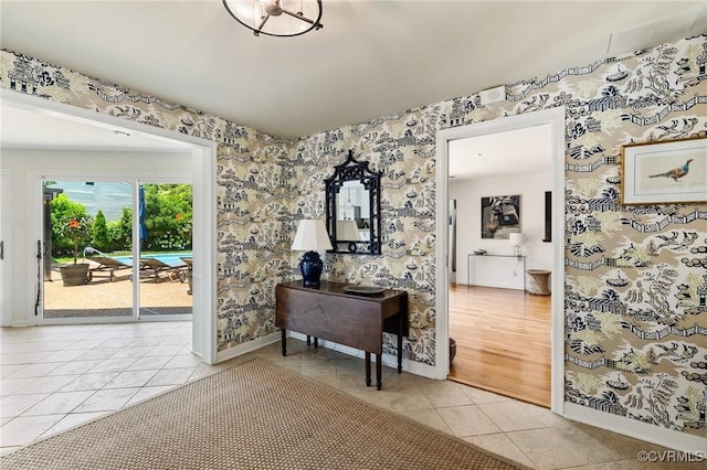 8950 Bellefonte Rd, Henrico, VA 23229 - hallway featuring wallpapered walls and light tile patterned flooring