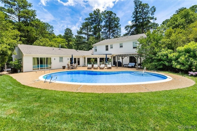 8950 Bellefonte Rd, Henrico, VA 23229 - swimming pool featuring a patio area, a lawn, and view of scattered trees