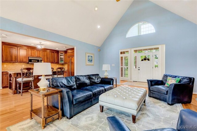 8467 Wendellshire Way, Mechanicsville, VA 23111 - living area featuring high vaulted ceiling, light wood-style flooring, plenty of natural light, and recessed lighting