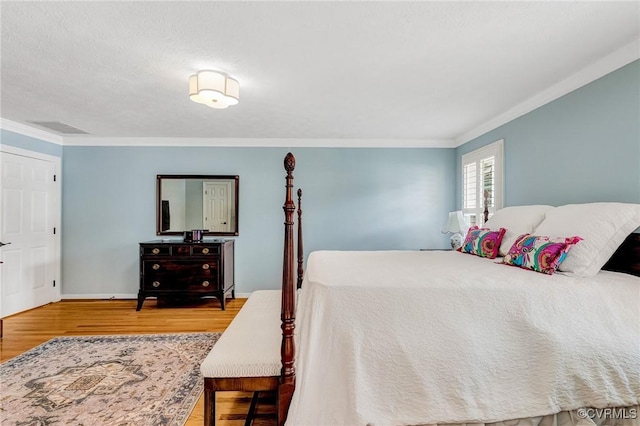 8467 Wendellshire Way, Mechanicsville, VA 23111 - bedroom with wood finished floors and ornamental molding