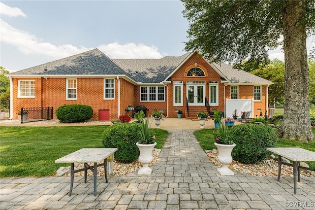 8467 Wendellshire Way, Mechanicsville, VA 23111 - rear view of property with french doors, brick siding, a lawn, and a shingled roof