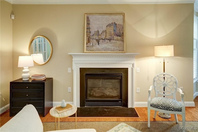 5116 Belmont Park Rd, Glen Allen, VA 23059 - detailed view of wood finished floors, a fireplace with flush hearth, and crown molding