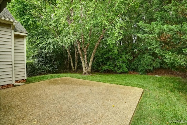 5116 Belmont Park Rd, Glen Allen, VA 23059 - view of grassy yard featuring a patio