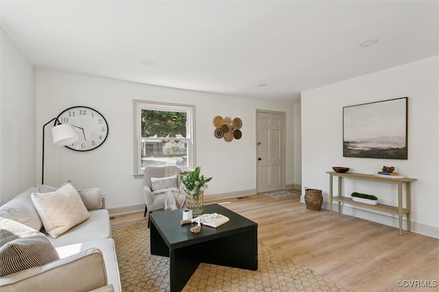 808 Penniman Rd, Williamsburg, VA 23185 - living room featuring light wood-style floors and baseboards