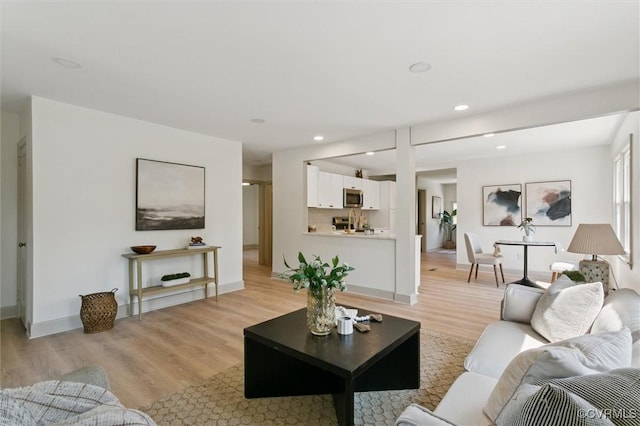 808 Penniman Rd, Williamsburg, VA 23185 - living room featuring light wood finished floors and recessed lighting