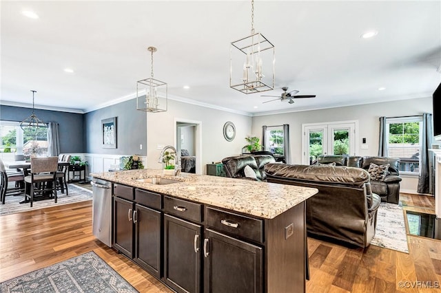 9401 Alsace Ct, Mechanicsville, VA 23116 - kitchen with open floor plan, plenty of natural light, stainless steel dishwasher, pendant lighting, and crown molding