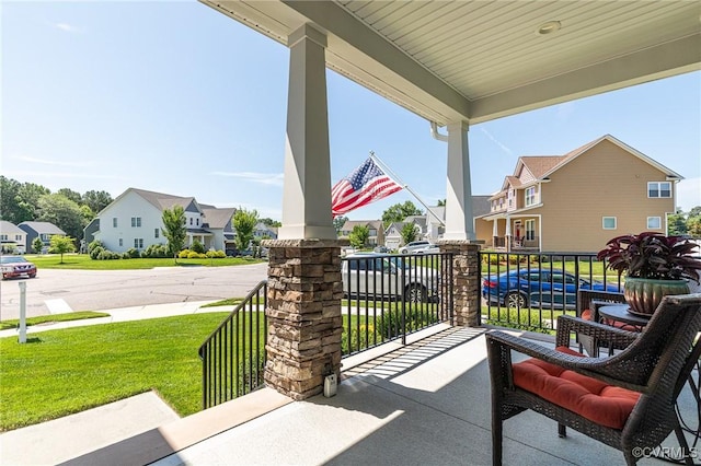 9401 Alsace Ct, Mechanicsville, VA 23116 - covered porch featuring a residential view and a yard