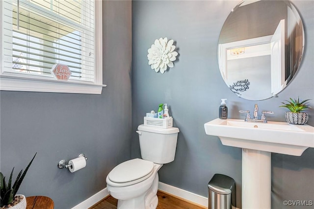 9401 Alsace Ct, Mechanicsville, VA 23116 - half bathroom featuring toilet and wood finished floors