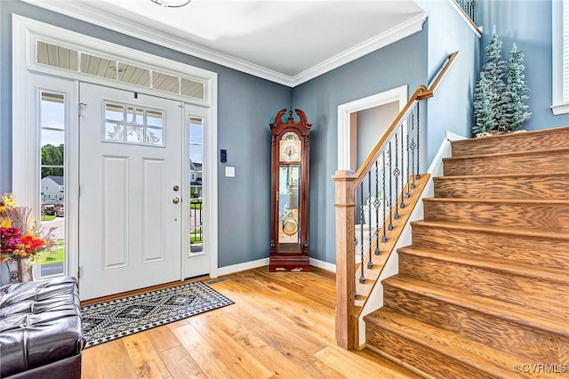 9401 Alsace Ct, Mechanicsville, VA 23116 - entryway with stairway, light wood-style floors, and ornamental molding